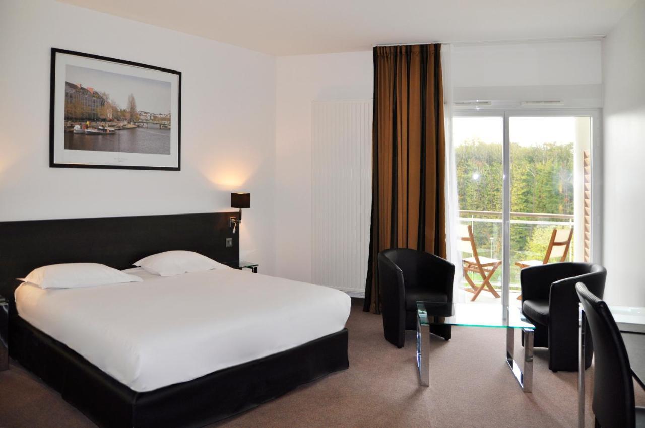 Golden Tulip Nantes Carquefou Suite Bagian luar foto