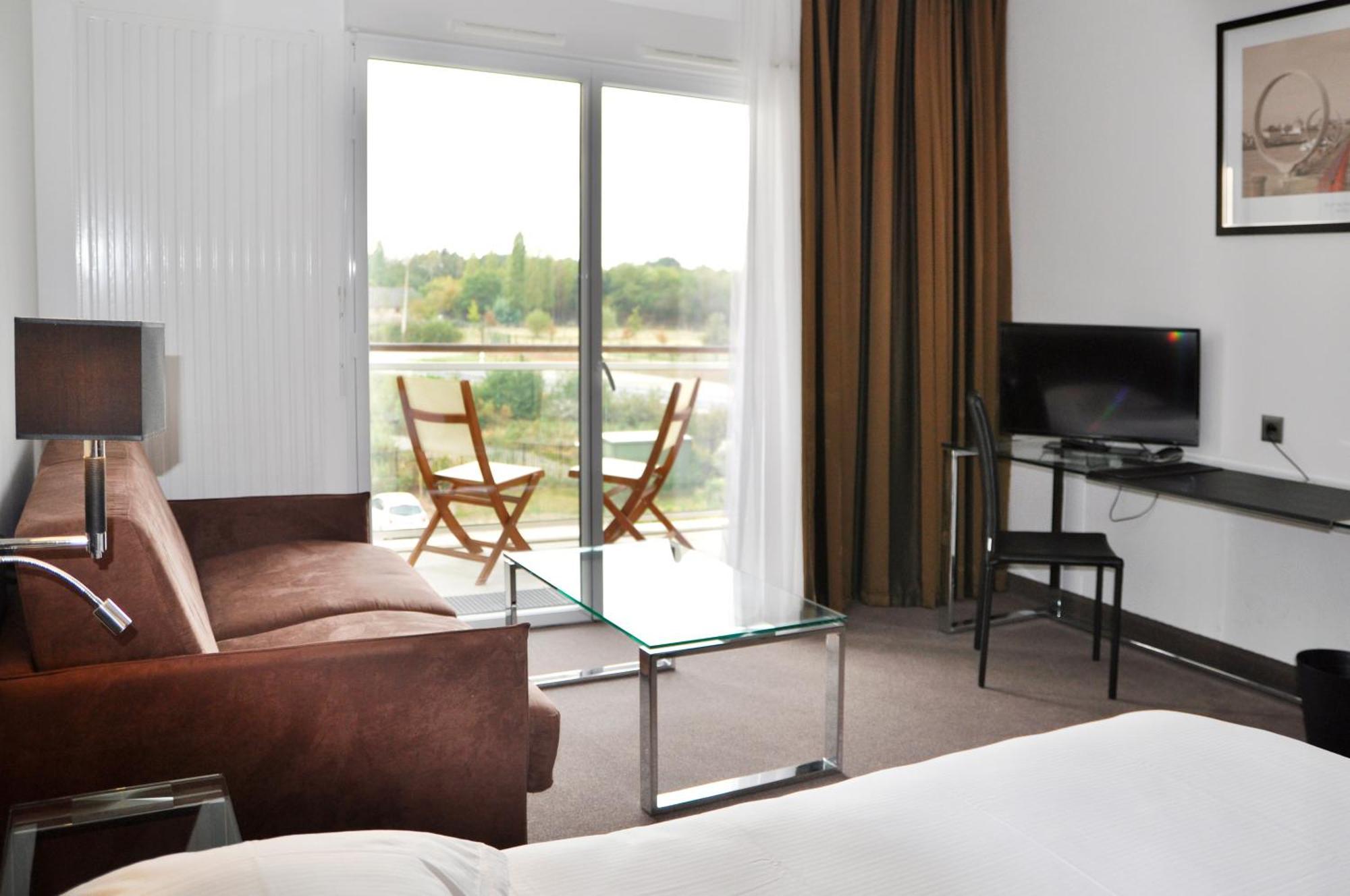 Golden Tulip Nantes Carquefou Suite Bagian luar foto