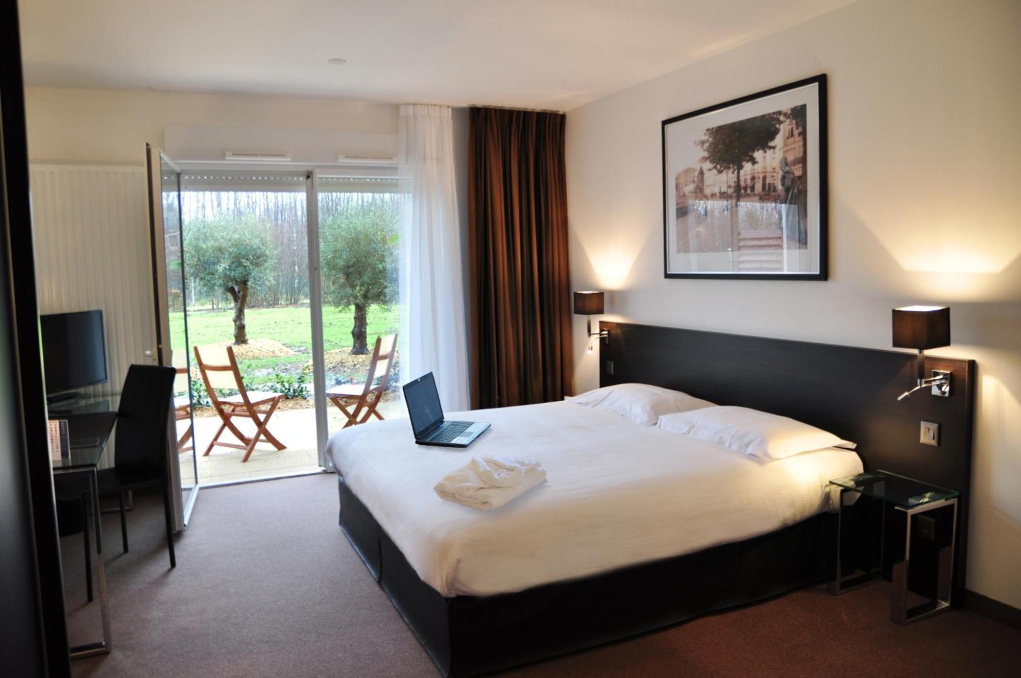 Golden Tulip Nantes Carquefou Suite Bagian luar foto