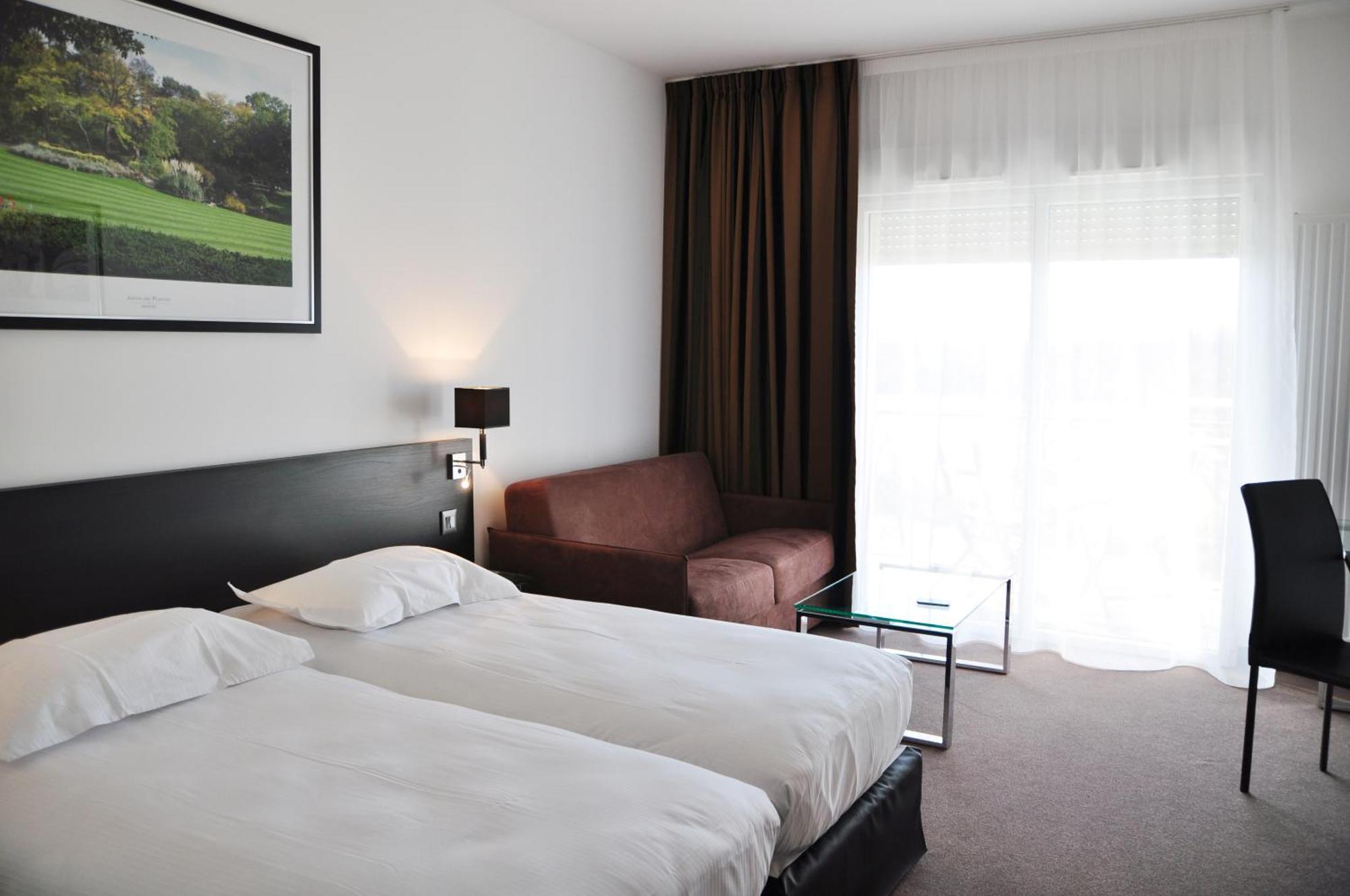 Golden Tulip Nantes Carquefou Suite Bagian luar foto